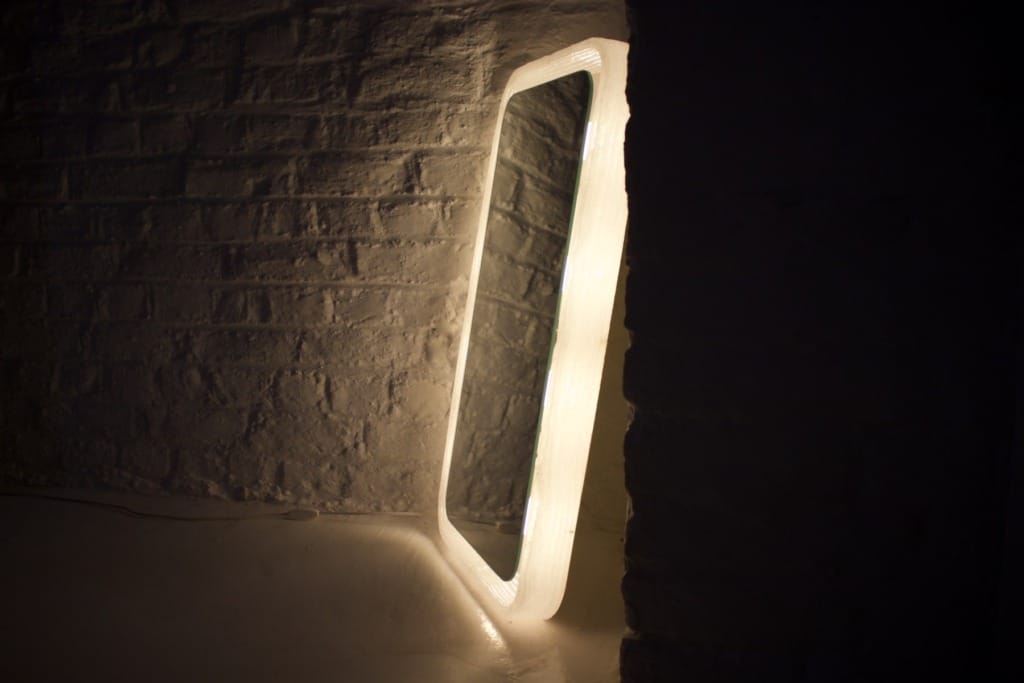 Illuminated acrylic mirror.