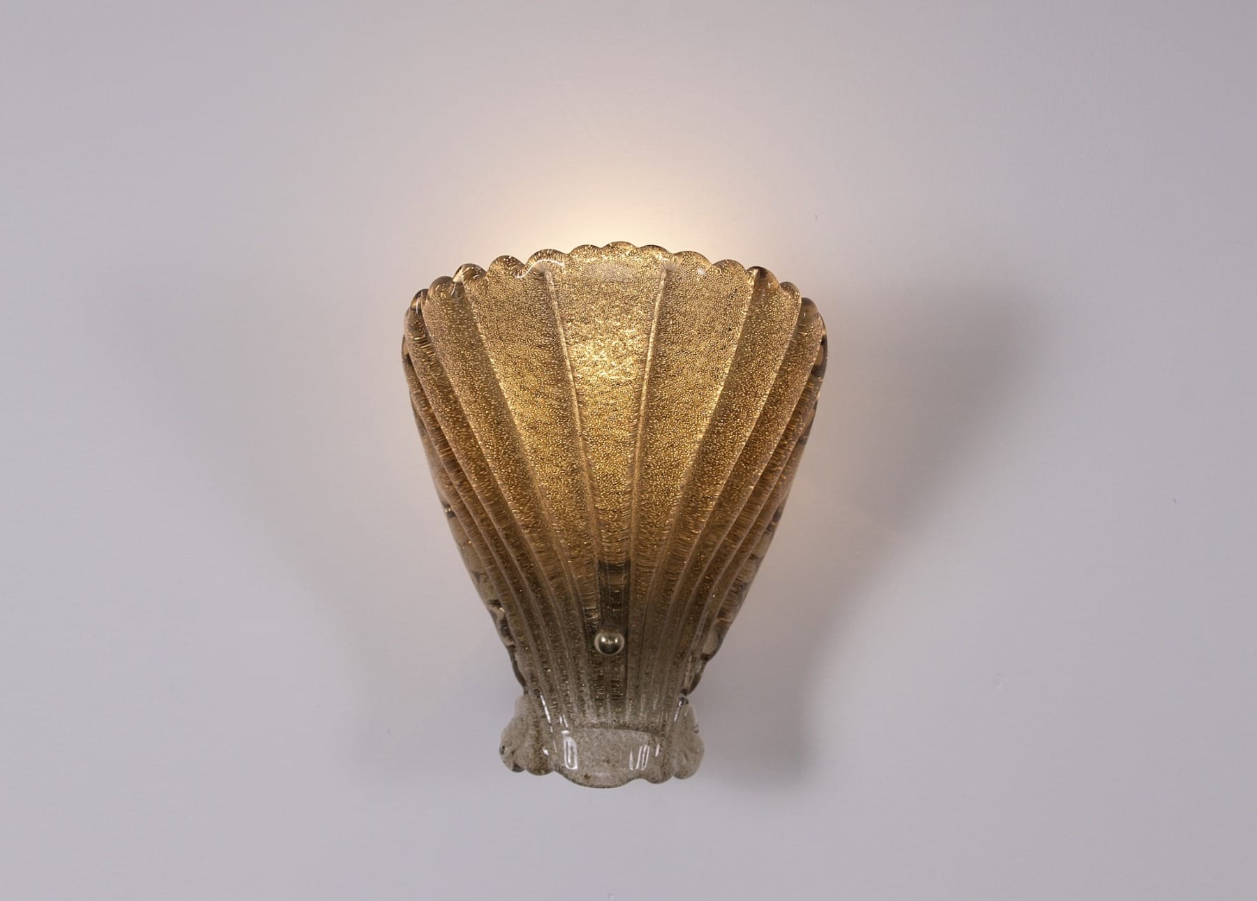 La douce lumière d'une des appliques Barovier Toso