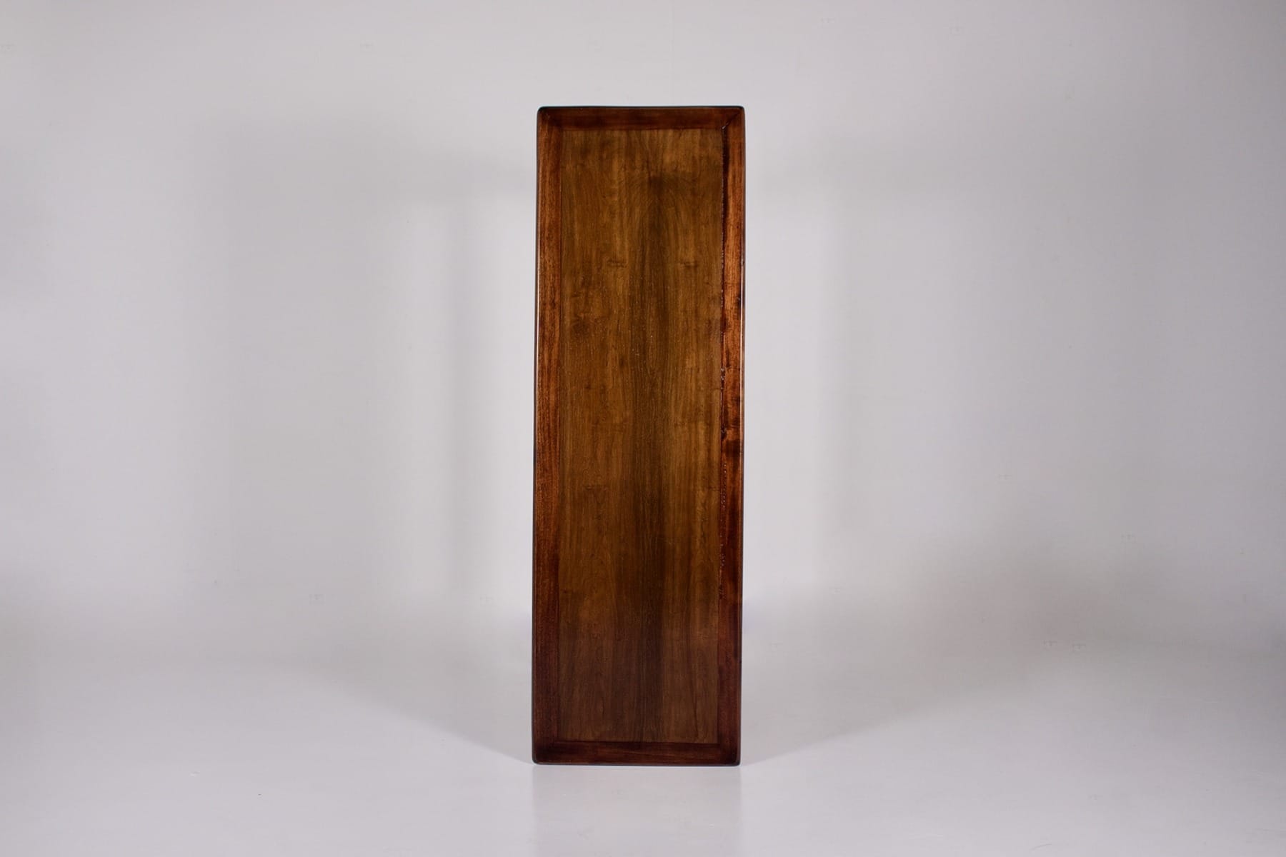 Le dessus de la console en palissandre style Sergio Rodriguez