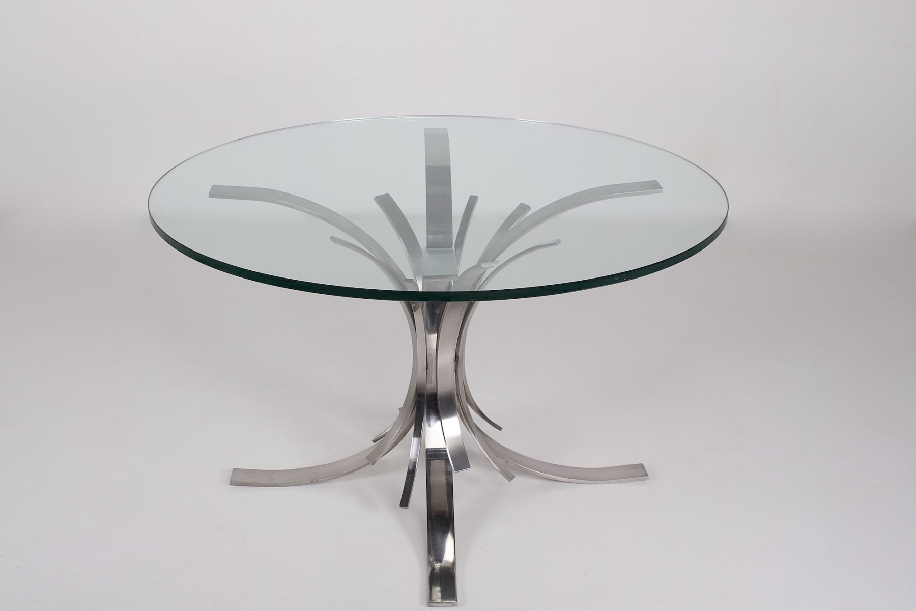 Table Gerbe ou Sheaf de Maria Pergay en acier poli et brossé avec sa dalle de verre ronde transparente