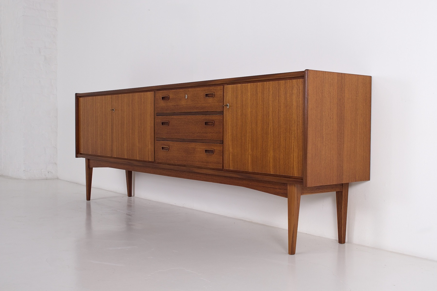 Left profile of the vintage teak sideboard
