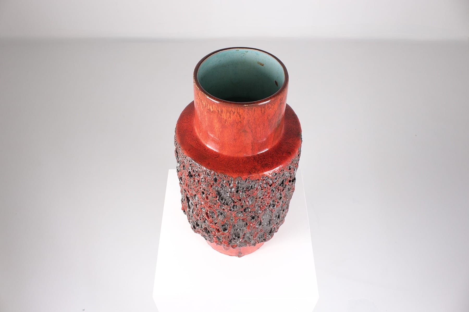 Overview of the turquoise glazed interior of the vase neck