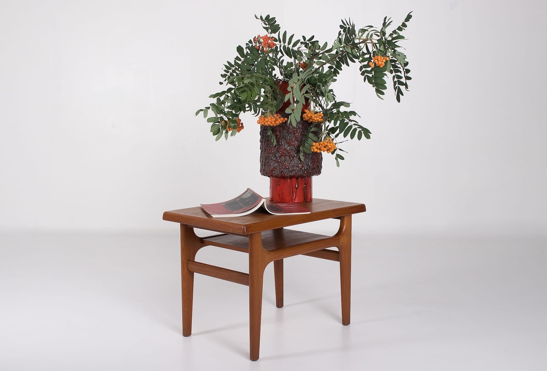 Sculptural West German Pottery Otto Keramik red and black vase on a Scandinavian coffee table